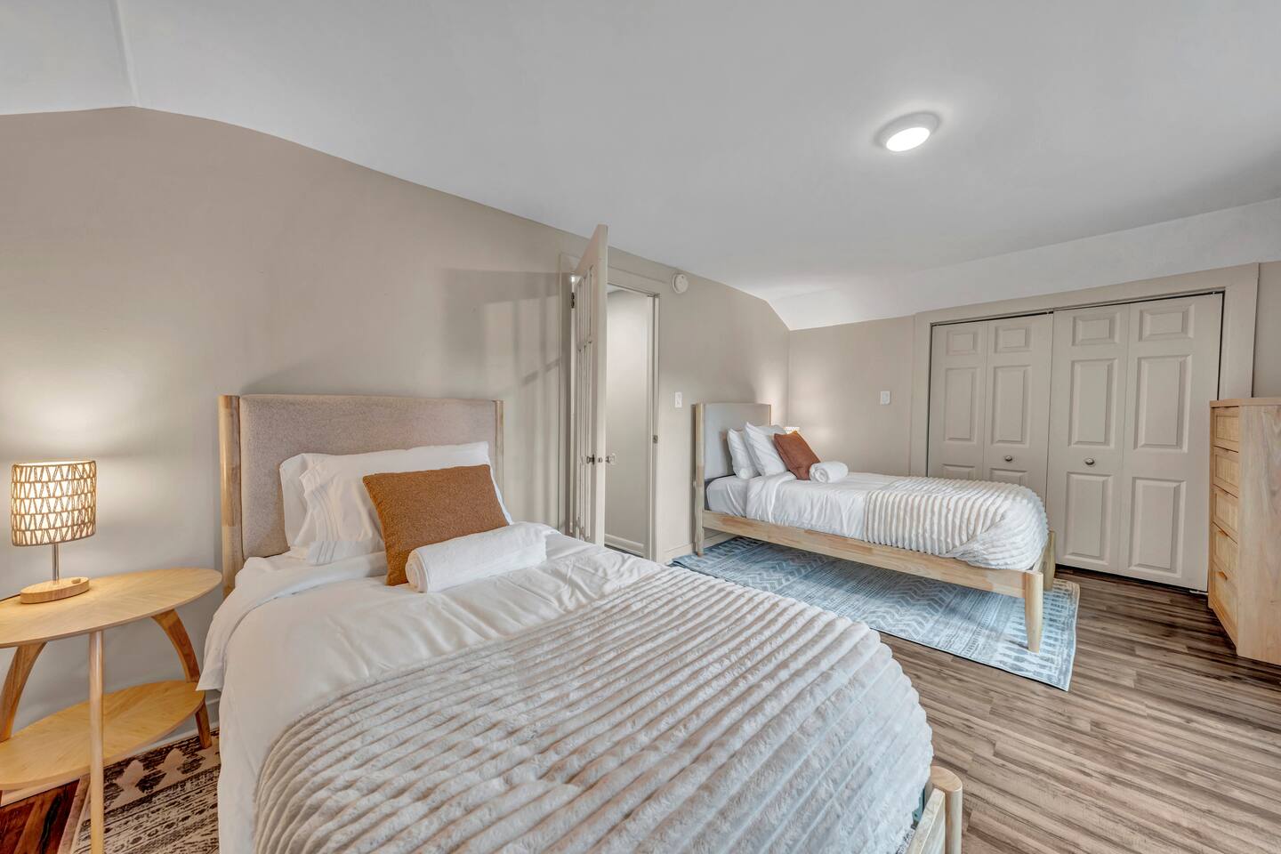Upstairs bedroom with two separate twin beds